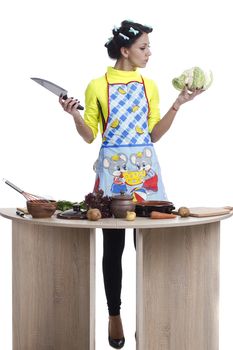 Beautiful woman preparing a meal on a white background