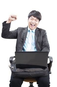 young business man working by internet online with laptop computer and fists up acting happy face isolated white background