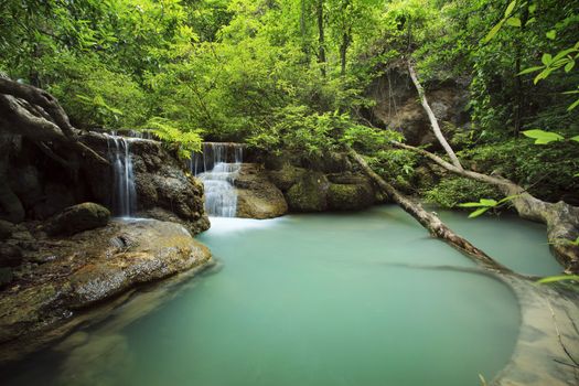 lime stone water fall in arawan water fall national park kanchanaburi thailand use for natural background 