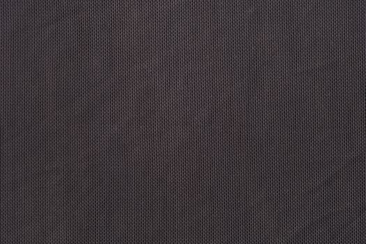 the abstract background texture of synthetic fabric