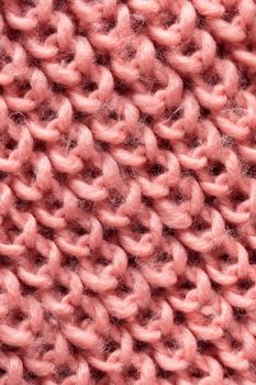 the abstract background texture of a knitted fabric