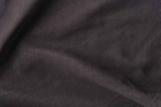 the abstract background texture of synthetic fabric