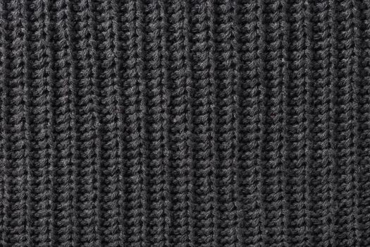 the abstract background texture of a knitted fabric