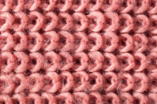 the abstract background texture of a knitted fabric