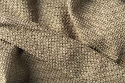 the abstract background texture of synthetic fabric