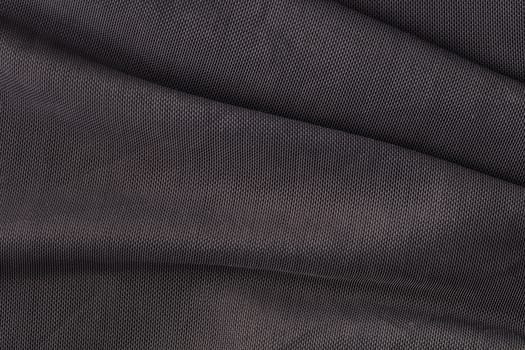 the abstract background texture of synthetic fabric