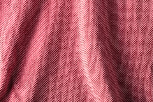 the abstract background texture of a knitted fabric