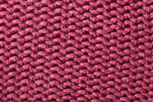 the abstract background texture of a knitted fabric