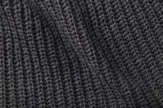 the abstract background texture of a knitted fabric