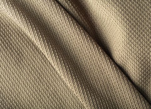 the abstract background texture of synthetic fabric