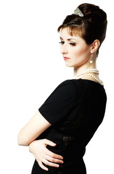 vintage Portrait of a beautiful young elegant woman. The girl in the image of Audrey Hepburn.