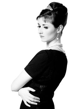 vintage Portrait of a beautiful young elegant woman. The girl in the image of Audrey Hepburn. Black and white photography