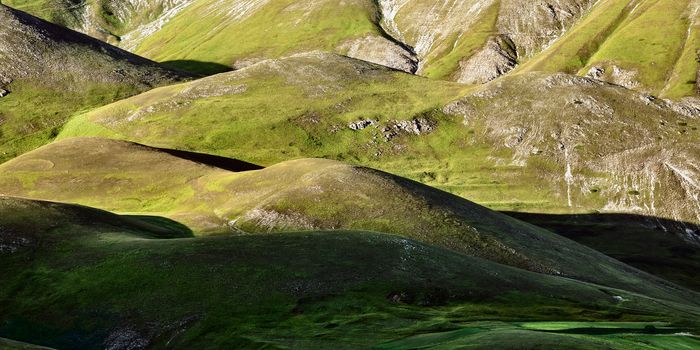 Beautiful green hills of Castelluccio in summer