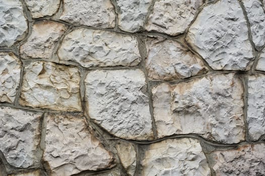 texture of the walls with wild stone for background.