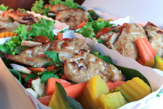 Grilled chicken steak with spices and vegetable paper tray vice banana leaves, Natural materials save the environment and Healthy diet meals.