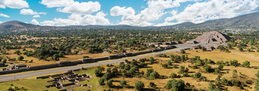 Aerial panorama of Avenue of the Dead and Pyramid of the Moon in Teotihuacan on a sunny day near Mexico City, Mexico.