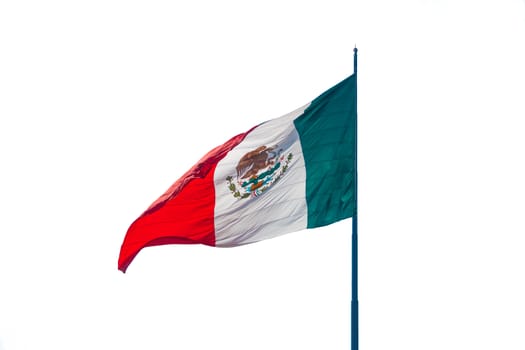 Flag of Mexico in the wind isolated over white background.