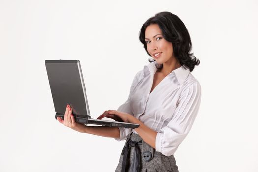 Young woman holding notebook in her hands