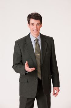 Young businessman in a suit on isolated background