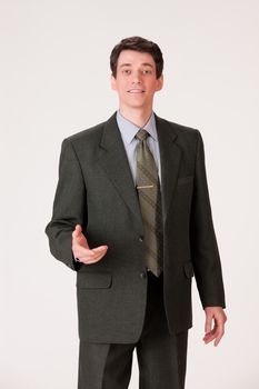 Young businessman in a suit on isolated background