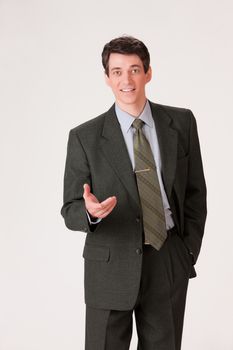 Young businessman in a suit on isolated background