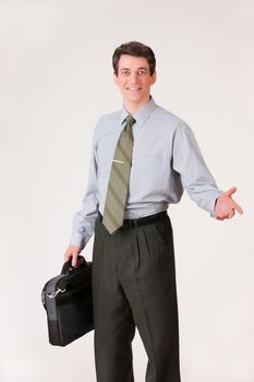 Young businessman in a suit on isolated background
