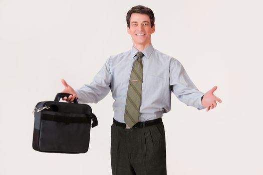 Young businessman in a suit on isolated background