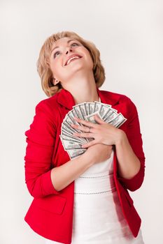 Young woman with a bunch of dollar banknotes