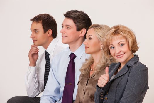 Group of young men and women on isolated background