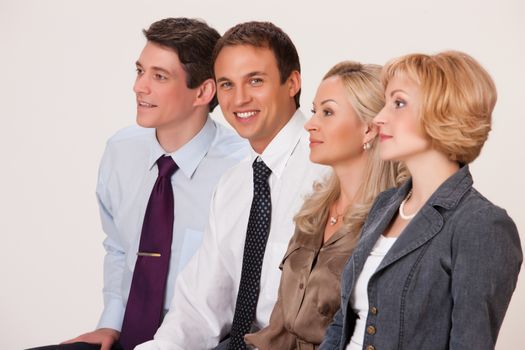 Group of young men and women on isolated background