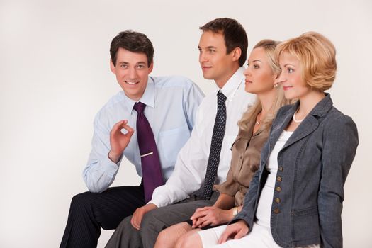 Group of young men and women on isolated background