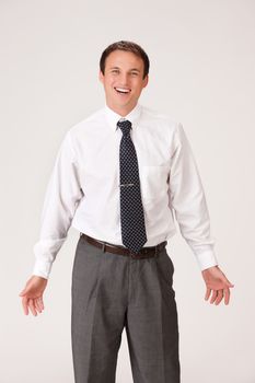 Young businessman in a suit on isolated background