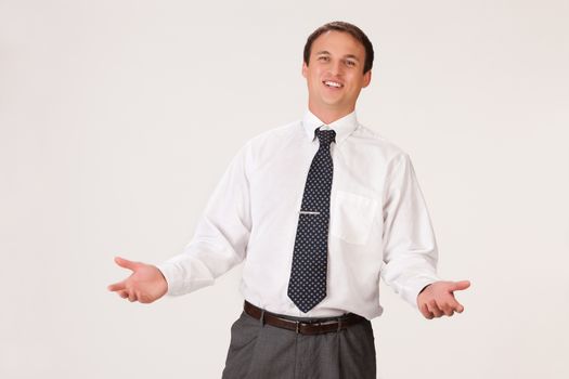 Young businessman in a suit on isolated background