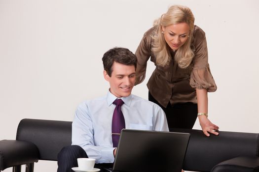 Young man and woman in business situation