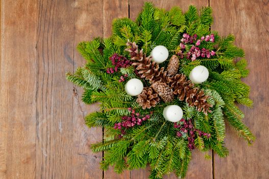 Christmas wreath advent wreath on wooden background with copy space