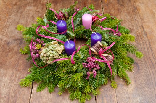 Christmas wreath advent wreath on wooden background with copy space