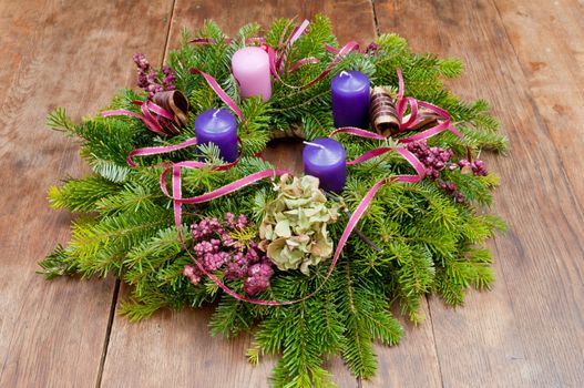 Christmas wreath advent wreath on wooden background with copy space