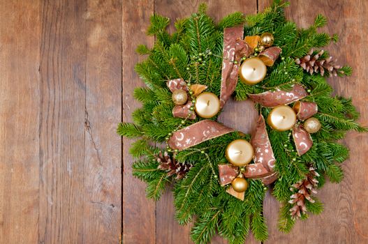 Christmas wreath advent wreath on wooden background with copy space