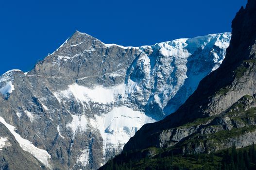 The Alps in Switzerland, high peaks steep valleys, Swiss Alps in Berner Oberland