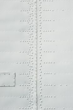 texture of the white metal plates with rivets.