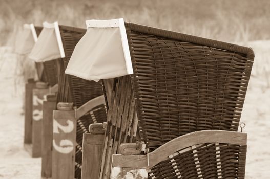 Strandkorb, Strandkoerbe in Rugen, Germany, Beach chairs on the sandy beach in Binz