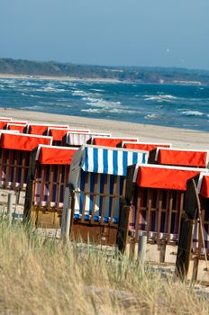 Strandkorb, Strandkoerbe in Rugen, Germany, Beach chairs on the sandy beach in Binz