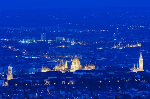 Evening skyline of Budapest with Parliament and Matthias Church, Hungary