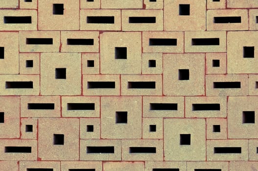Concrete wall surface built from various rectangular blocks horizontal
