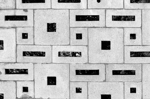 Concrete wall surface built from various rectangular blocks horizontal