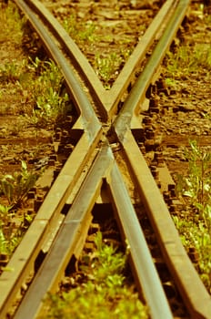 Old railway tracks forming the letter x