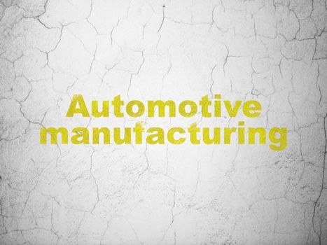 Manufacuring concept: Yellow Automotive Manufacturing on textured concrete wall background