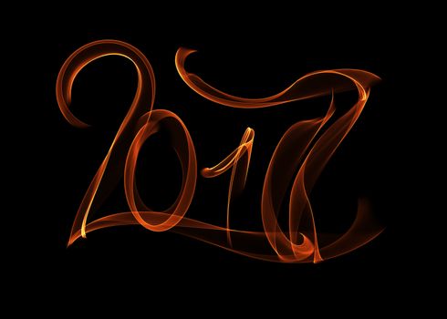 Happy new year 2017 isolated numbers lettering written with fire flame or smoke on black background.