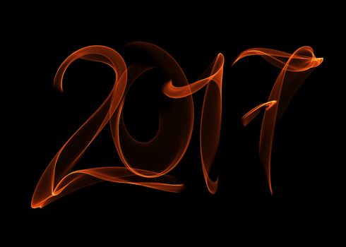 Happy new year 2017 isolated numbers lettering written with fire flame or smoke on black background.