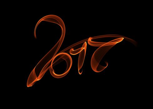 Happy new year 2017 isolated numbers lettering written with fire flame or smoke on black background.